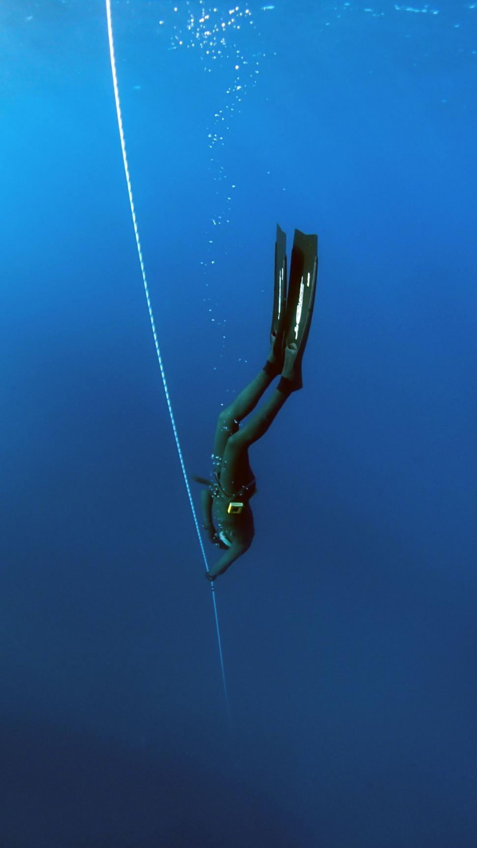 Free Image of Person Surfing on a Surfboard in the Water 