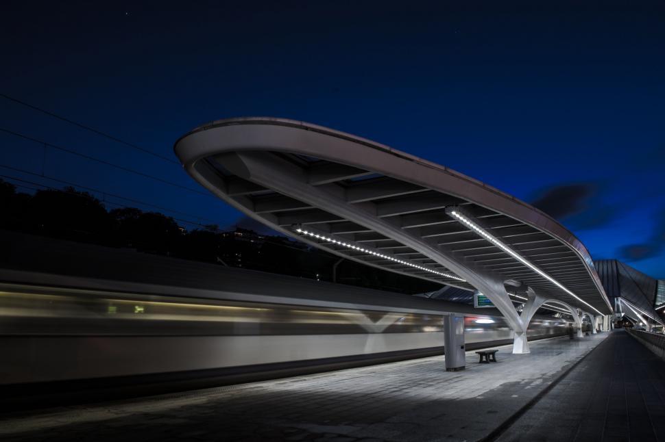 Free Image of Busy Train Station Illuminated at Night 