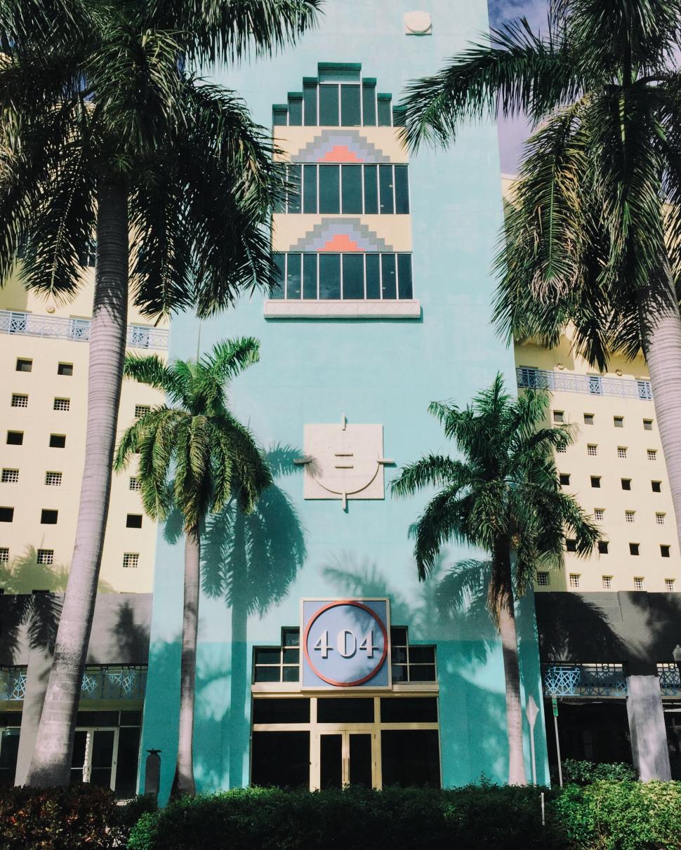 Free Image of Tall Building With Clock on Front 
