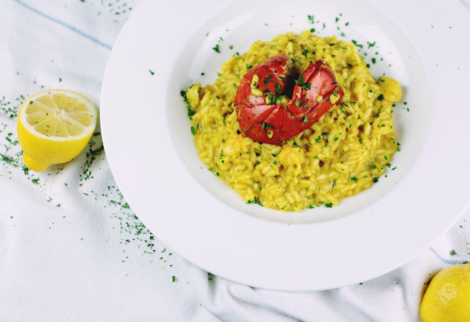 Free Image of White Plate Topped With a Bowl of Food 