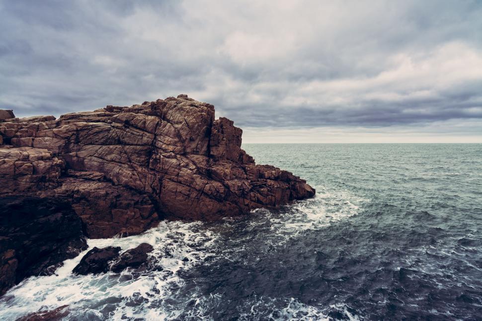 Free Image of Rock Outcropping in the Middle of the Ocean 
