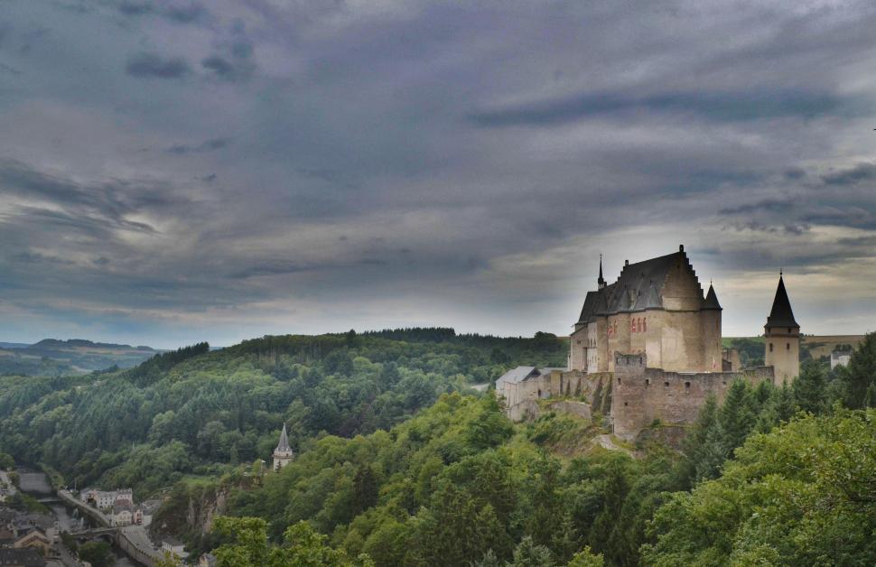 Free Image of Majestic Castle on Green Hillside 