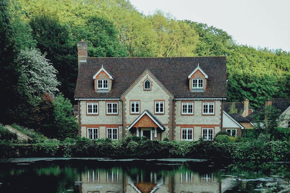 Free Image of Large House Next to Waterfront 