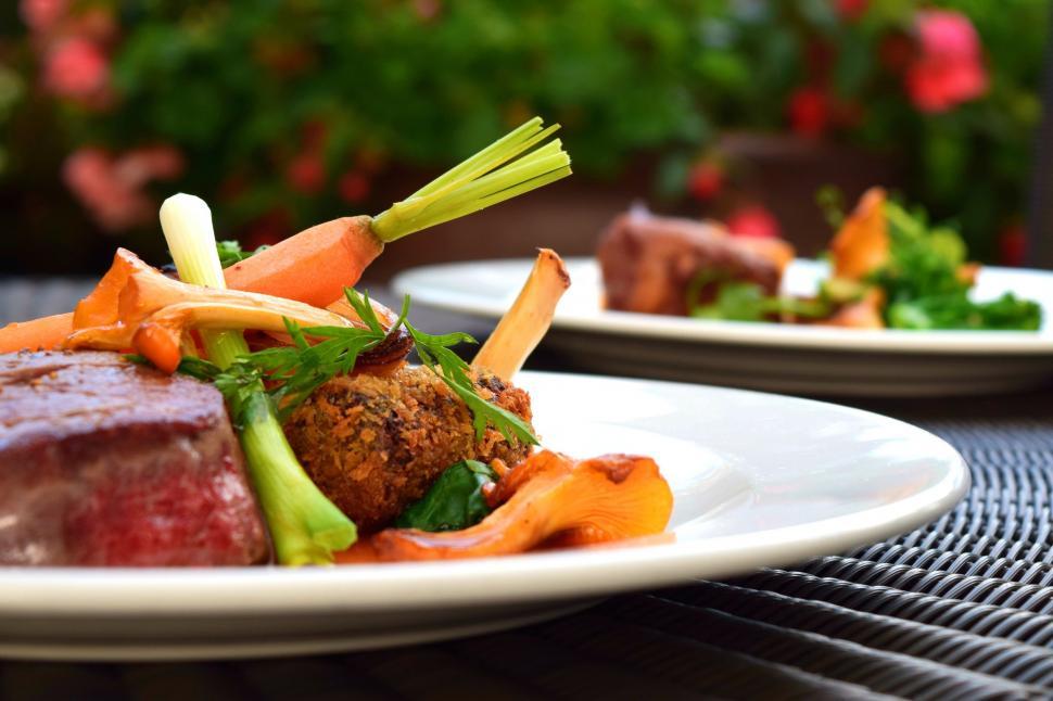 Free Image of Plate of Meat and Vegetables on a Table 