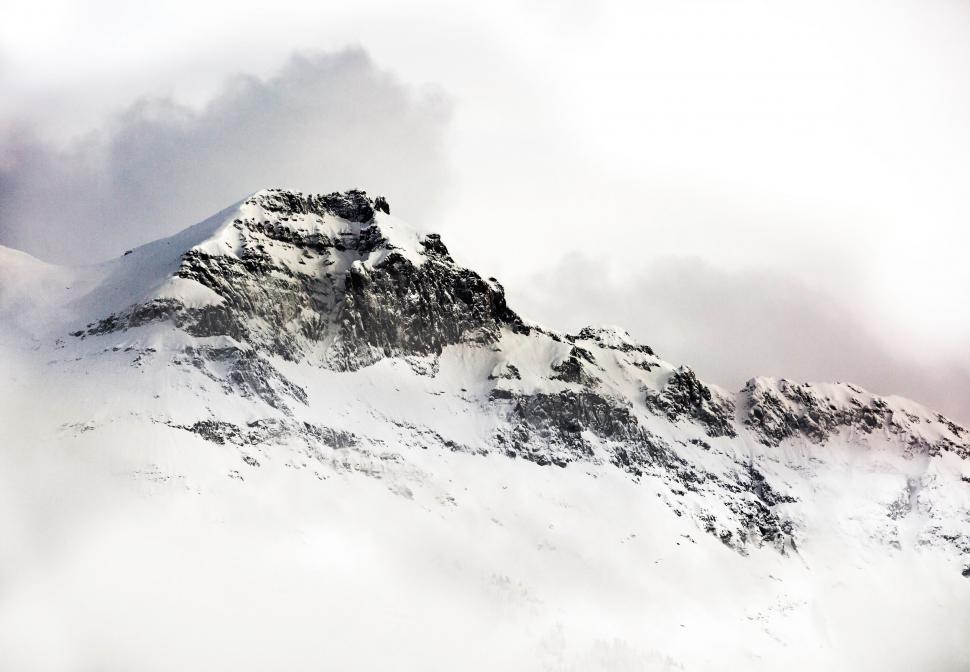 Free Image of Snow-Covered Mountain in Black and White 