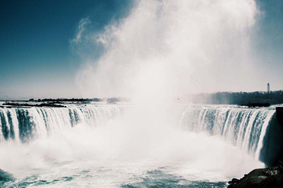 Free Image of Majestic Waterfall Cascading Down 