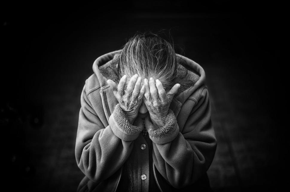 Free Image of Person Covering Face With Hands 