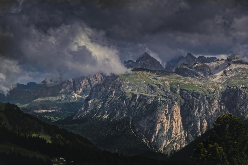 Free Image of Majestic Mountain Range Under Cloudy Sky 