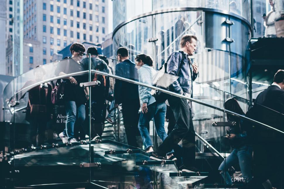 Free Image of Group of People Standing on Top of Stairs 