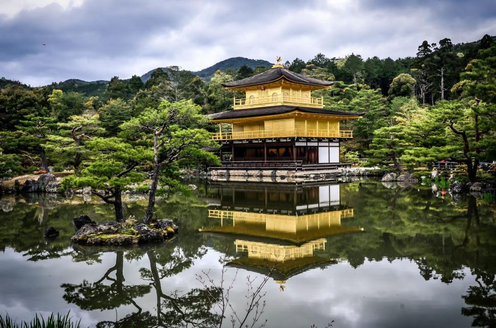 Free Image of Yellow Building Floating in Lake 