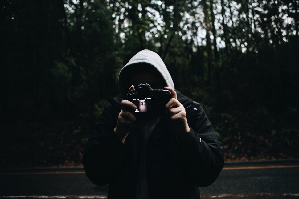 Free Image of Person Taking a Picture With a Camera 