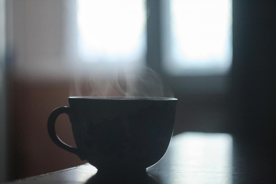 Free Image of Coffee Cup on Wooden Table 