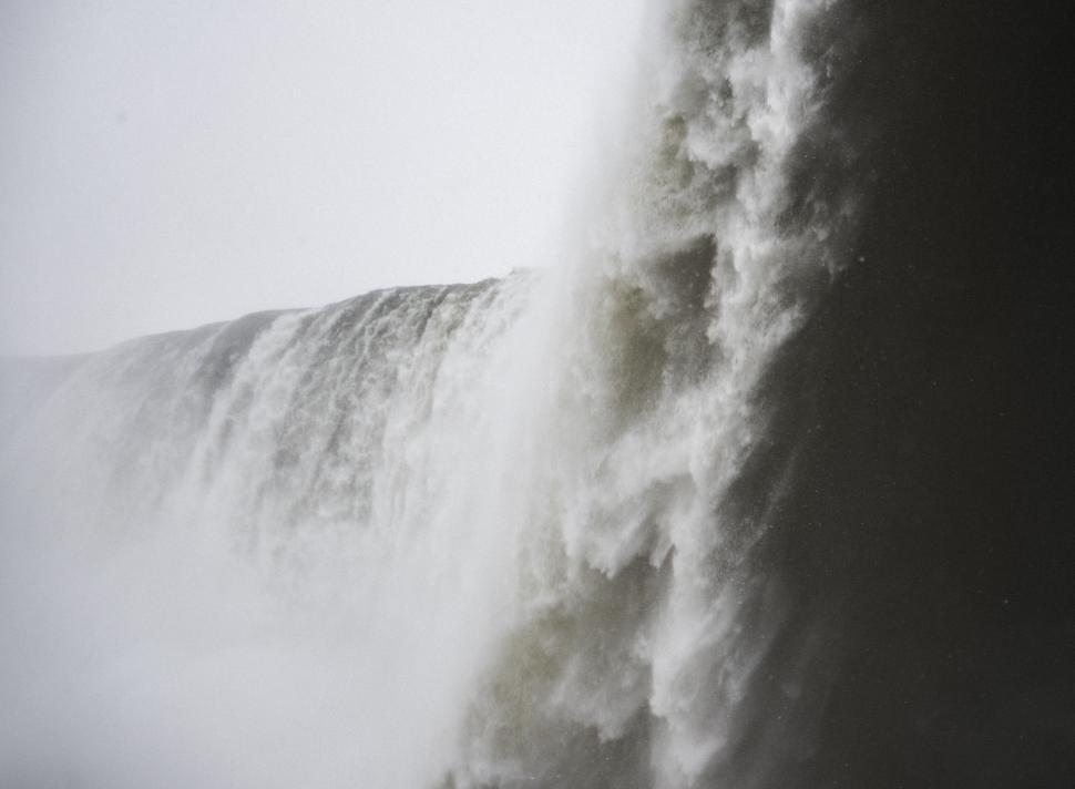 Free Image of A Black and White Photo of a Waterfall 