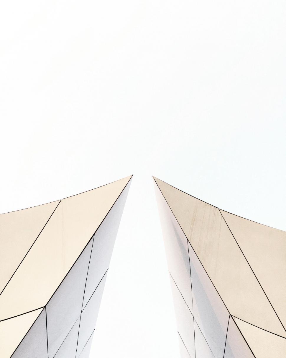 Free Image of Two Tall Buildings Standing Side by Side 