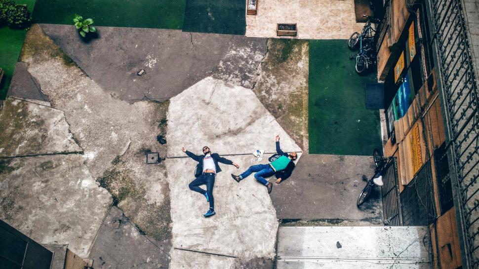 Free Image of Couple Standing on Cement Slab 