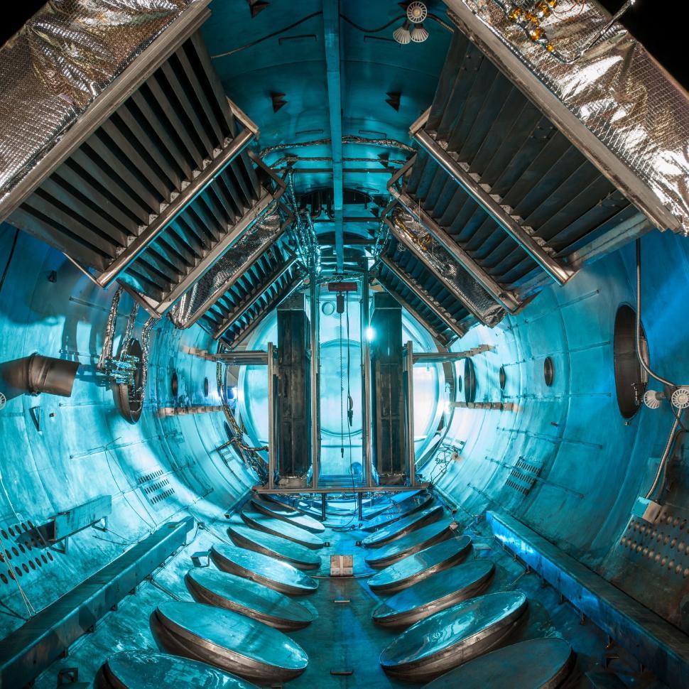 Free Image of The Interior of a Large Metal Object With Blue Lights 