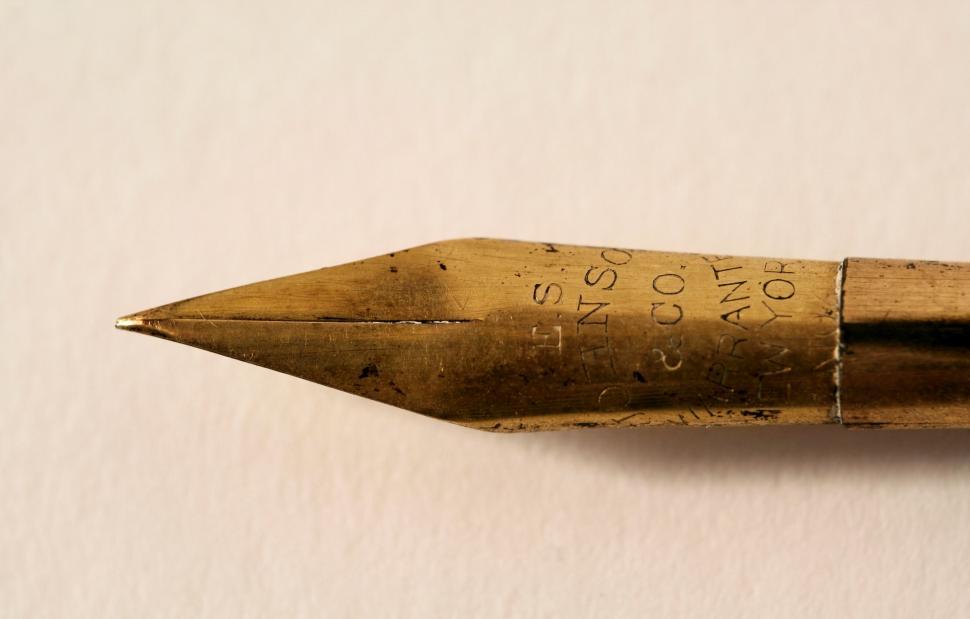 Free Image of Close Up of Pen With Writing 