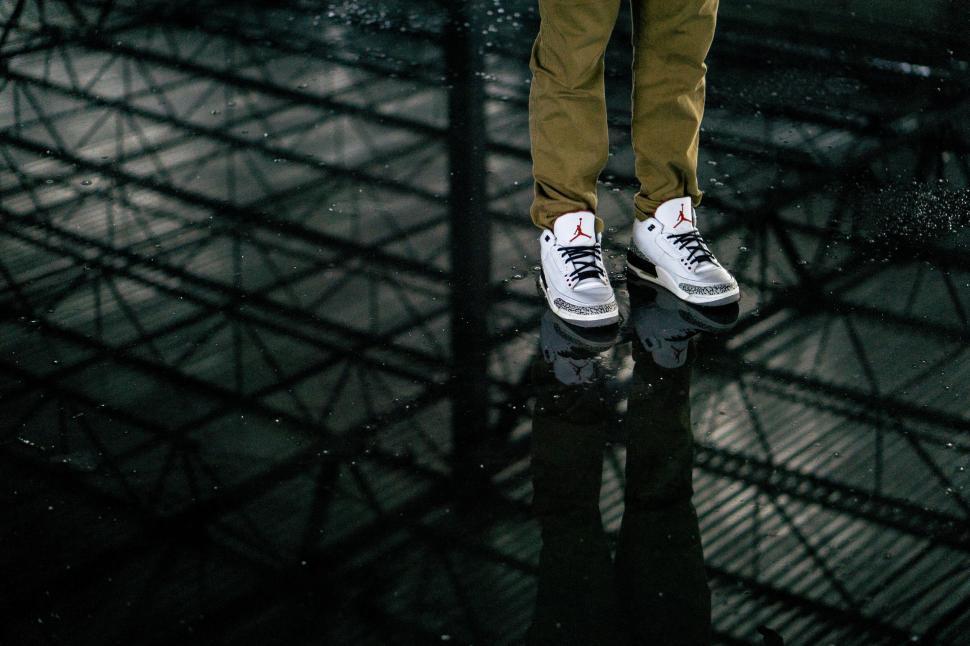 Free Image of Person Standing on Top of Metal Structure 