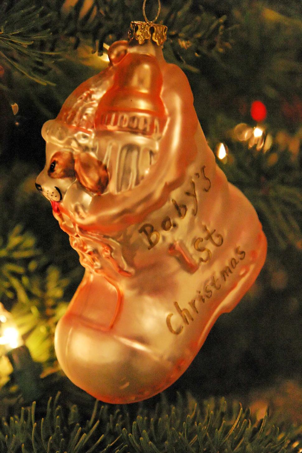 Free Image of Glass Ornament Hanging From Christmas Tree 