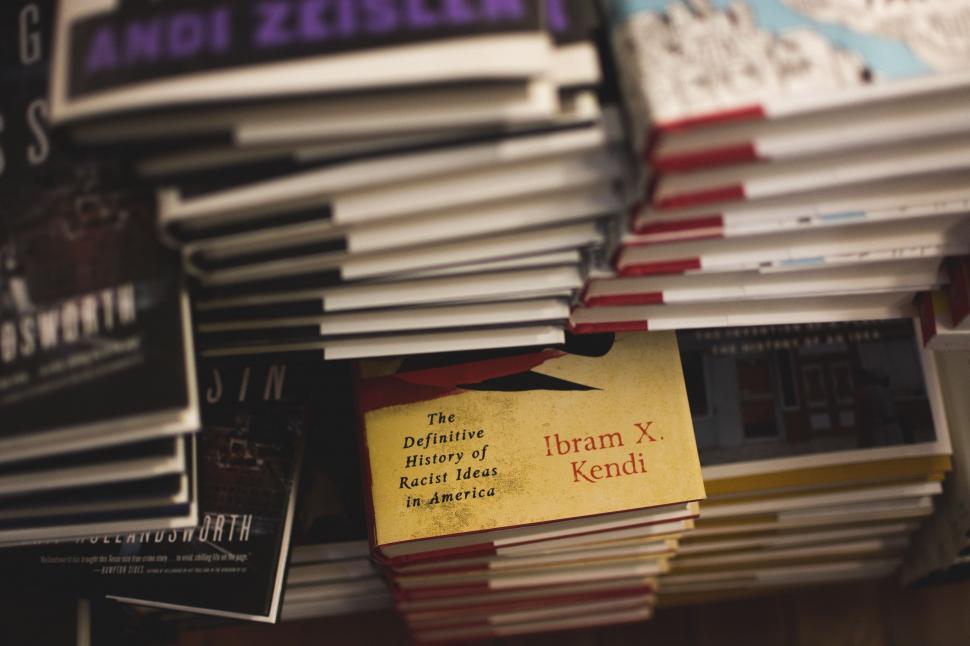Free Image of Stack of Books on Wooden Table 