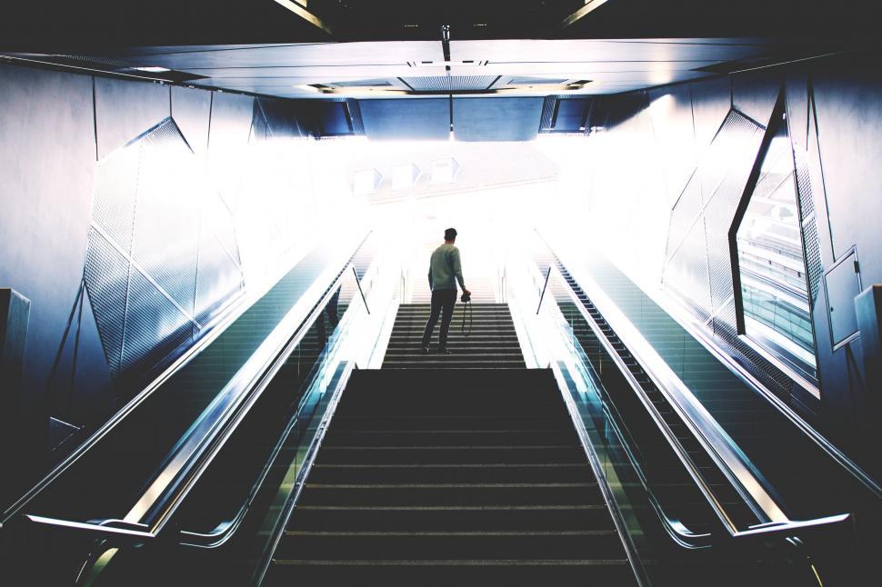 Free Image of Man Descending Concrete Staircase 
