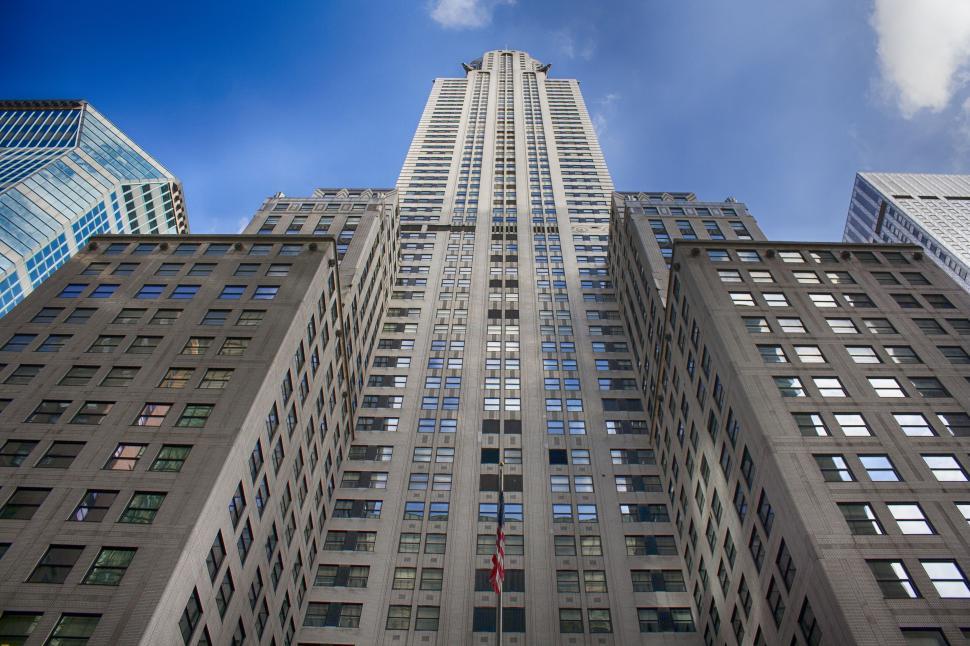 Free Image of Looking Up at the Top of a Tall Building 