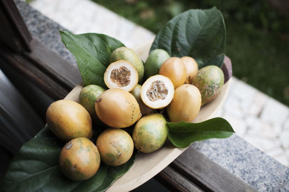 Free Image of Wooden Bowl Filled With Fruit on Wooden Bench 