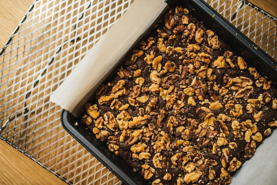 Free Image of A Pan of Food on a Wooden Table 