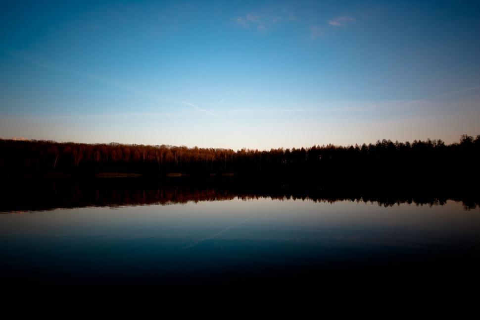 Free Image of Water Body With Background Trees 
