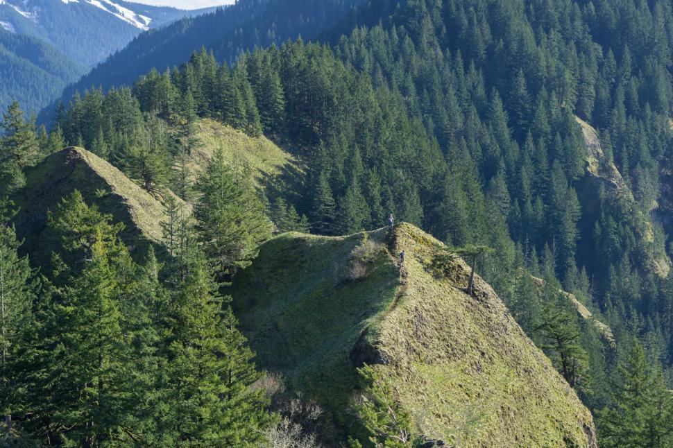 Free Image of Man Snowboarding Down Mountain 
