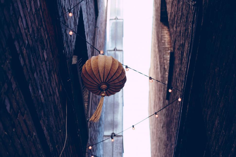 Free Image of Narrow Alleyway With Hanging Lantern 