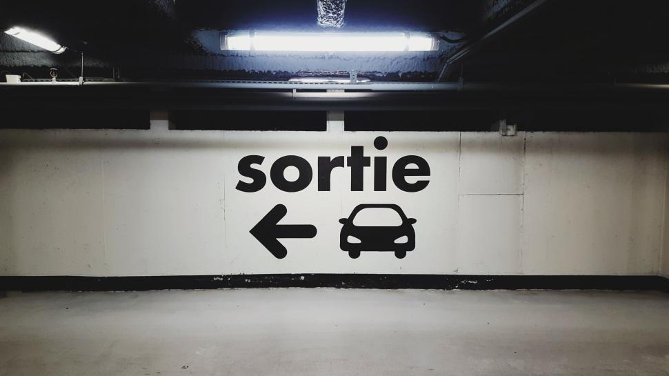 Free Image of Black and White Photo of a Parking Garage 