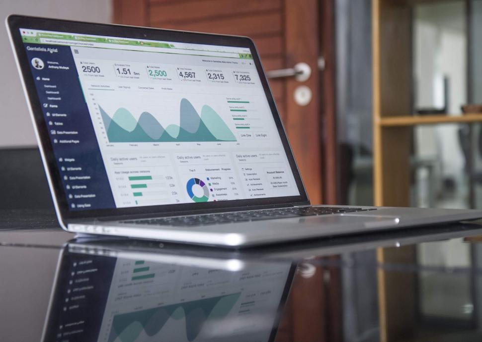 Free Image of Laptop Computer on Glass Table 
