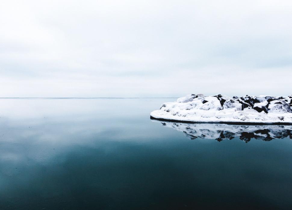 Free Image of Small Island in the Middle of a Body of Water 
