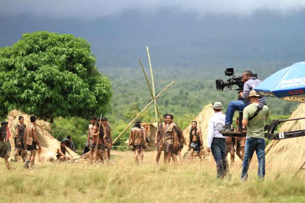 Free Image of Group of People Capturing Photos in Field 