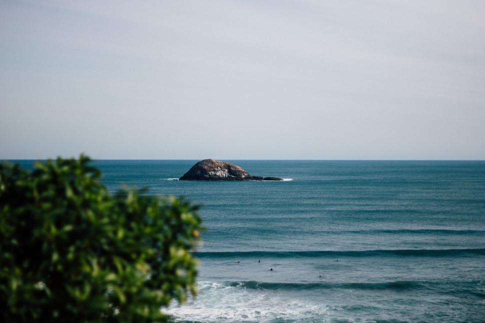 Free Image of Small Island in the Middle of a Body of Water 