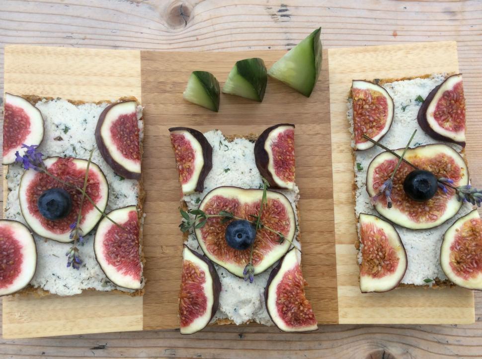 Free Image of Fresh Fruit Slices on Cutting Board 