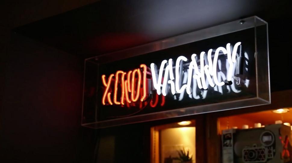Free Image of Neon Sign on the Side of a Building 
