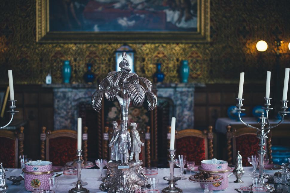 Free Image of Elegant Dining Room Table With Ornate Centerpiece 
