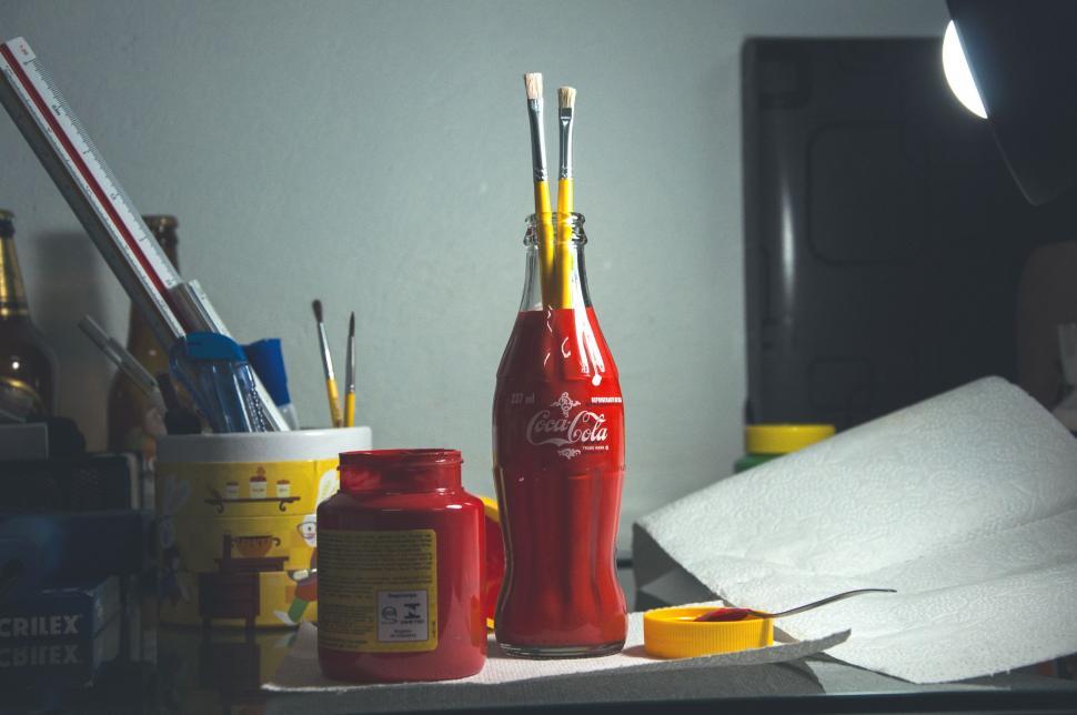 Free Image of Table Displaying Assorted Bottles and Items 