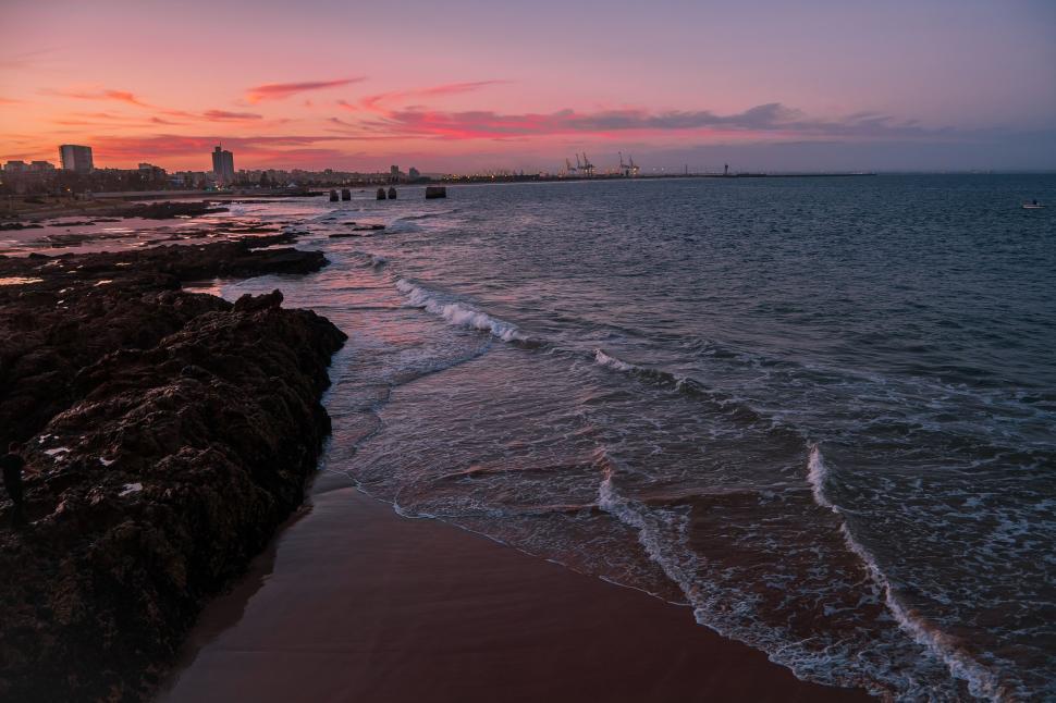 Free Image of Beach With Waves Washing Up on Shore 