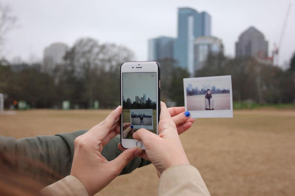 Free Image of Person Taking Picture With Cell Phone 