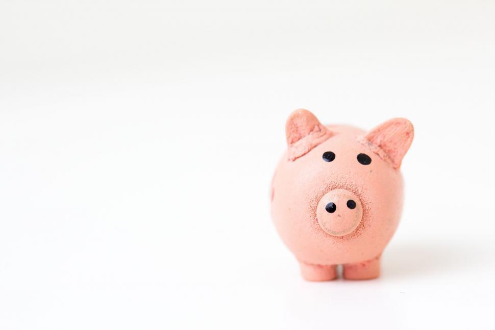 Free Image of Pink Piggy Bank on White Table 