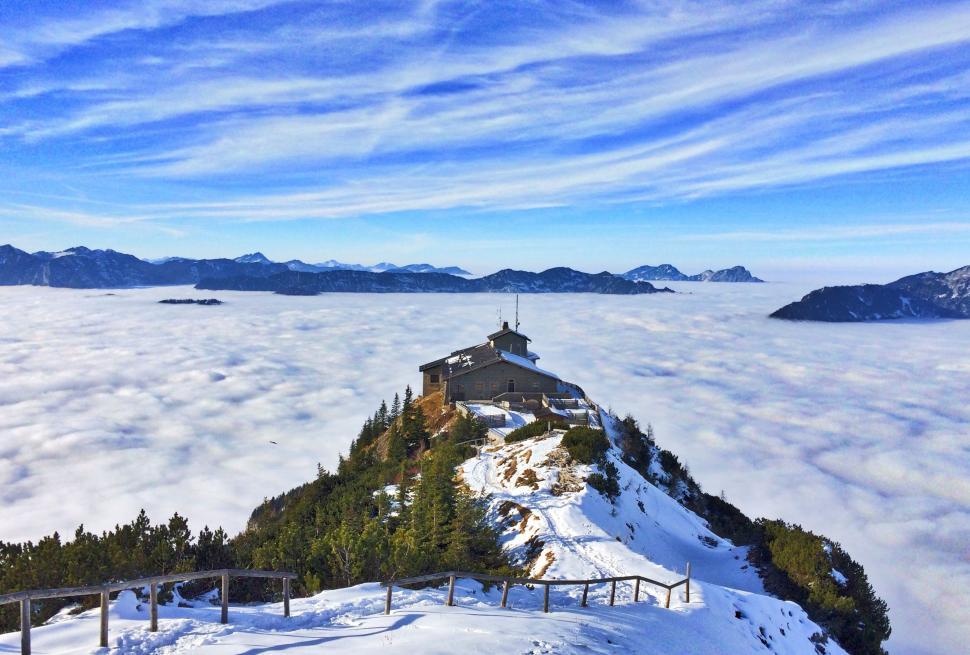 Free Image of Snowy Mountain With Building 