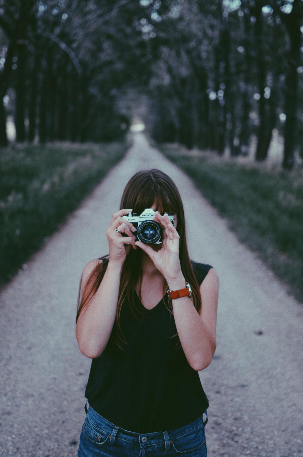 Free Image of Woman Taking a Selfie With Camera 