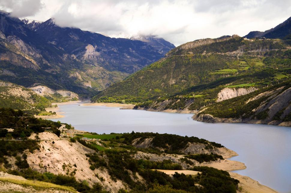 Free Image of Majestic Lake Surrounded by Towering Mountains 
