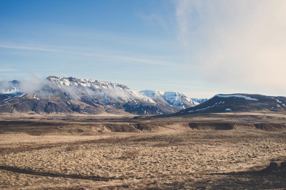 Free Image of Majestic Snow Covered Mountains in the Distance 
