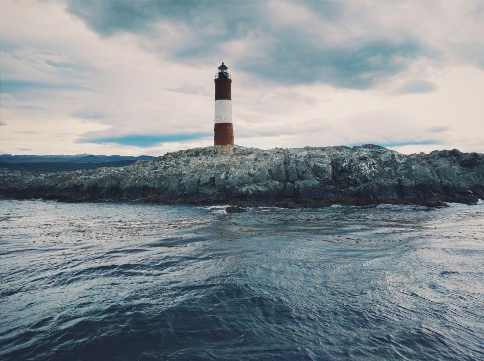 Free Image of Light House on Ocean Rock 