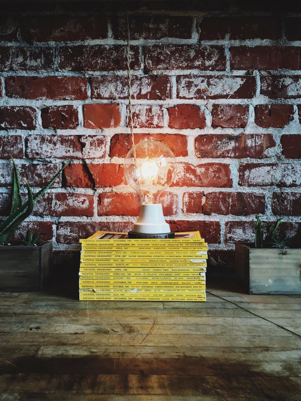 Free Image of Stack of Books on Wooden Table 