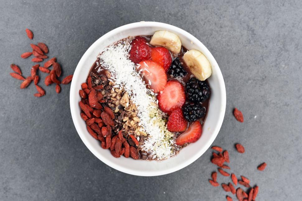 Free Image of Bowl Filled With Fruit and Nuts on Table 